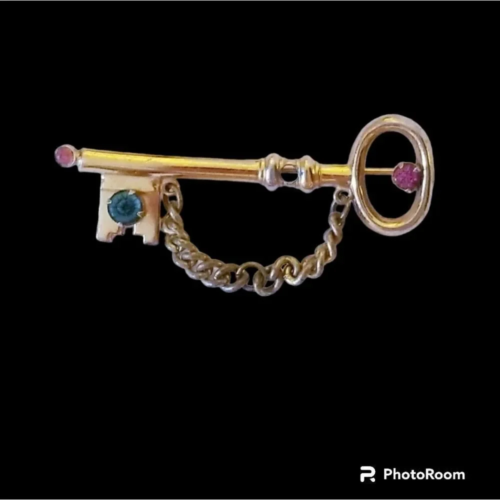 Vintage Coro Pegasus rhinestone chain key brooch